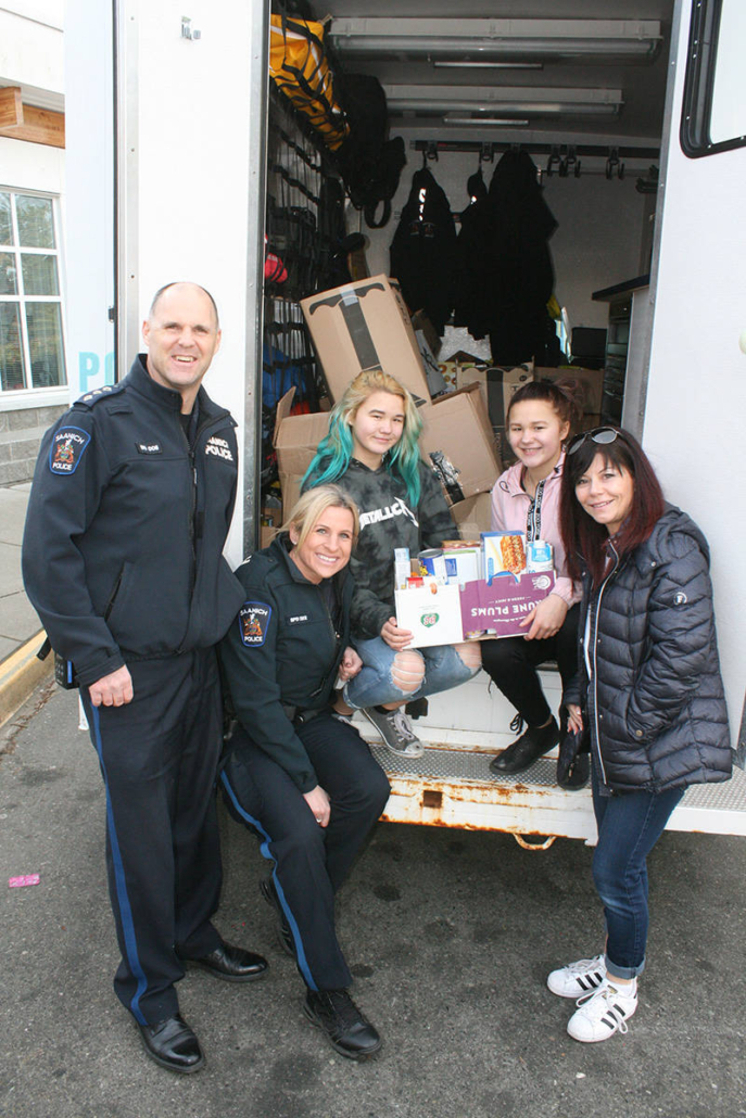 Saanich Police & Colquitz Students Cram Cruiser - from Sooke News Mirror